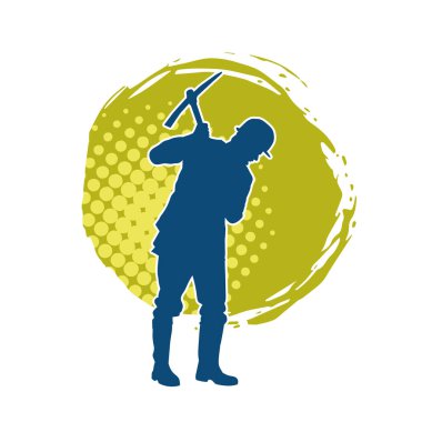 Görev sırasında baltayla dolaşan işçi kostümlü bir adamın silüeti. Bir madencinin hareket halindeki silueti balta aracı ile poz verir.