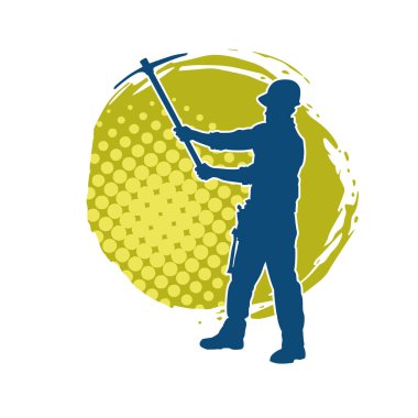 Görev sırasında baltayla dolaşan işçi kostümlü bir adamın silüeti. Bir madencinin hareket halindeki silueti balta aracı ile poz verir.