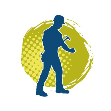 Çekiç aleti taşıyan bir işçinin silüeti. Hareket halindeki bir işçinin silueti çekiç aleti ile poz verir.