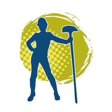 Çalışan kostümü giyen bir kadının silüeti. Kürek aletleriyle poz veriyor..