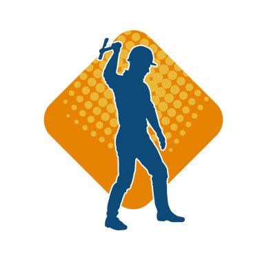 Hareket halindeki bir işçinin silueti, baltasını kullanarak poz verir..