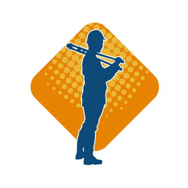 Elinde kerpeten aleti olan bir erkek işçinin silueti.