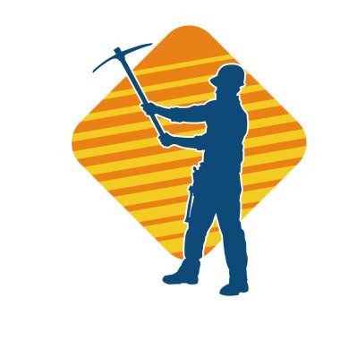 Görev sırasında baltayla dolaşan işçi kostümlü bir adamın silüeti. Bir madencinin hareket halindeki silueti balta aracı ile poz verir.