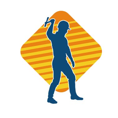 Hareket halindeki bir işçinin silueti, baltasını kullanarak poz verir..