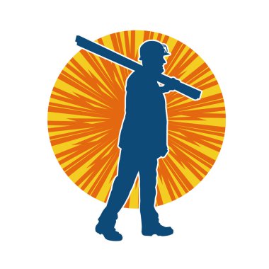 Tahta taşıyan bir inşaat işçisinin silueti..