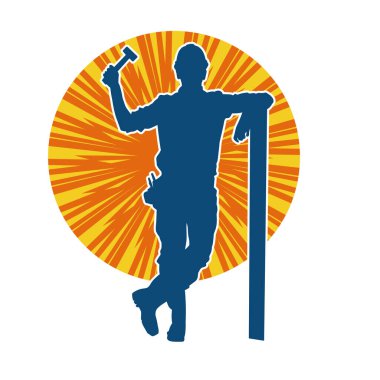 Tahta taşıyan bir inşaat işçisinin silueti..