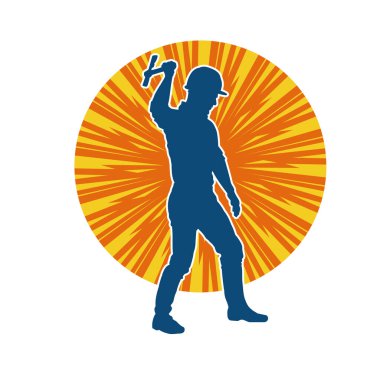 Hareket halindeki bir işçinin silueti, baltasını kullanarak poz verir..