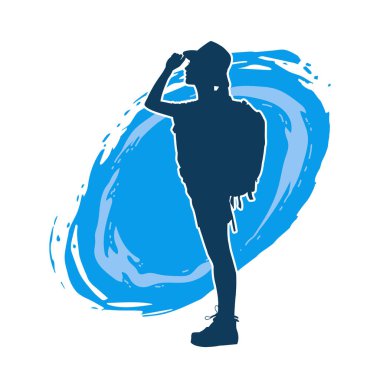 Sırt çantalı bir kadın gezginin silüeti.