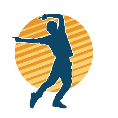 Hareket halindeki bir erkek dansçının silueti. Dans eden zayıf bir adamın silueti..