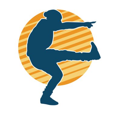 Hareket halindeki bir erkek dansçının silueti. Dans eden zayıf bir adamın silueti..