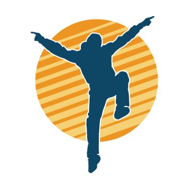 Hareket halindeki bir erkek dansçının silueti. Dans eden zayıf bir adamın silueti..