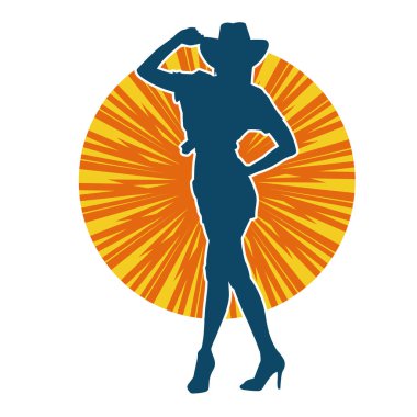 Kovboy kostümü giymiş bir kadın modelin silueti. Poz vermiş bir kovboy kızın silueti..