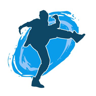 Hareket halindeki bir erkek dansçının silueti. Dans eden zayıf bir adamın silueti..