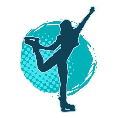 Buz pateninde dans eden genç, zayıf bir kadının silueti. Buz pateni yapan bir kadının silueti.,