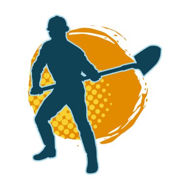 Kürek taşıyan bir işçinin silüeti. Bir işçinin hareket halindeki silueti kürek aracı kullanarak poz verir.