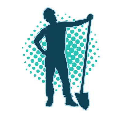 Kürek taşıyan bir işçinin silüeti. Bir işçinin hareket halindeki silueti kürek aracı kullanarak poz verir.