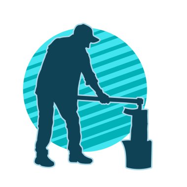 Uzun şaft baltasıyla odun kesen bir erkek işçinin silueti.