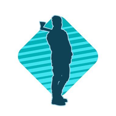 Balta taşıyan bir adamın silüeti. Balta taşıyan erkek bir oduncunun silueti..