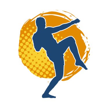 Hareketli erkek kickboksör atletinin silueti. Tekme atan bir adamın silueti..