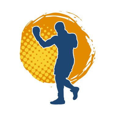 Erkek boks atletinin silueti iş başında. Boks sporu için eldiven giyen kaslı bir adamın silueti..