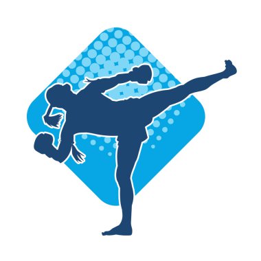 Hareketli erkek kickboksör atletinin silueti. Tekme atan bir adamın silueti..