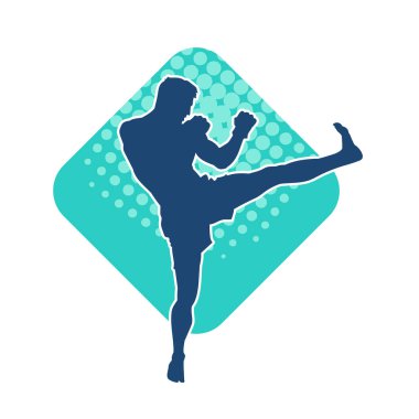 Hareketli erkek kickboksör atletinin silueti. Tekme atan bir adamın silueti..