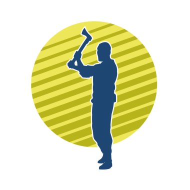 Balta taşıyan bir adamın silüeti. Balta taşıyan erkek bir oduncunun silueti..