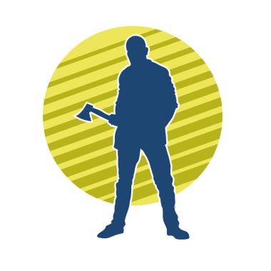 Balta taşıyan bir adamın silüeti. Balta taşıyan erkek bir oduncunun silueti..