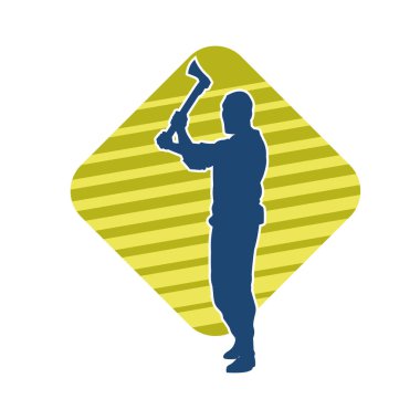 Balta taşıyan bir adamın silüeti. Balta taşıyan erkek bir oduncunun silueti..