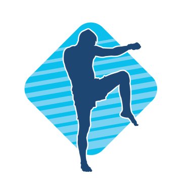 Hareketli erkek kickboksör atletinin silueti. Tekme atan bir adamın silueti..