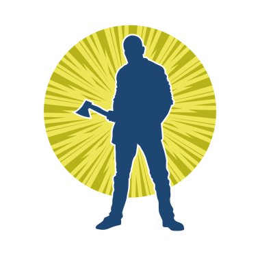 Balta taşıyan bir adamın silüeti. Balta taşıyan erkek bir oduncunun silueti..