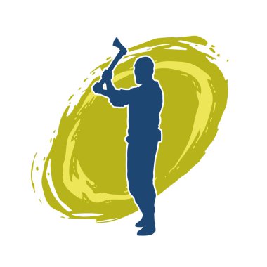 Balta taşıyan bir adamın silüeti. Balta taşıyan erkek bir oduncunun silueti..