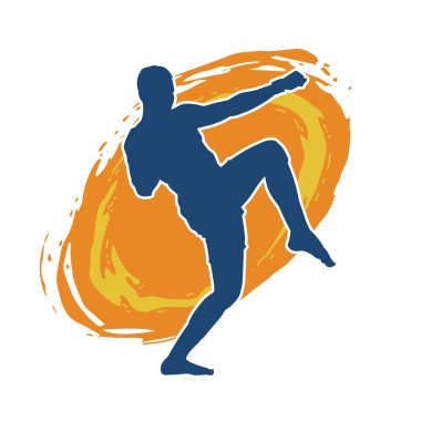 Hareketli erkek kickboksör atletinin silueti. Tekme atan bir adamın silueti..