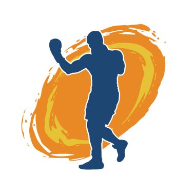 Erkek boks atletinin silueti iş başında. Boks sporu için eldiven giyen kaslı bir adamın silueti..