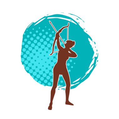 Dişi okçu bir dövüşçünün silueti ok ve yayla pozisyonunu alıyor..