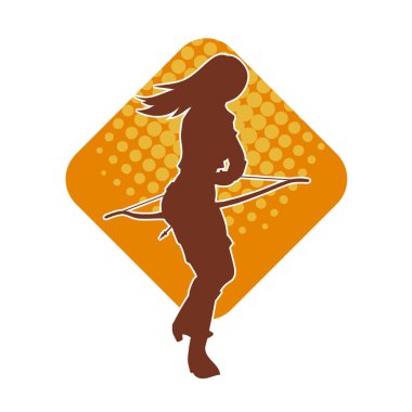 Dişi okçu bir dövüşçünün silueti ok ve yayla pozisyonunu alıyor..