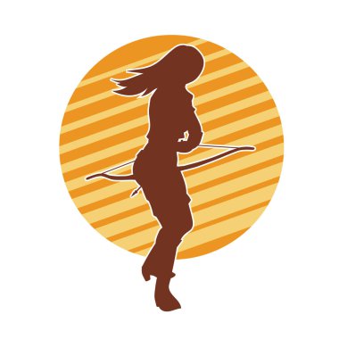 Dişi okçu bir dövüşçünün silueti ok ve yayla pozisyonunu alıyor..