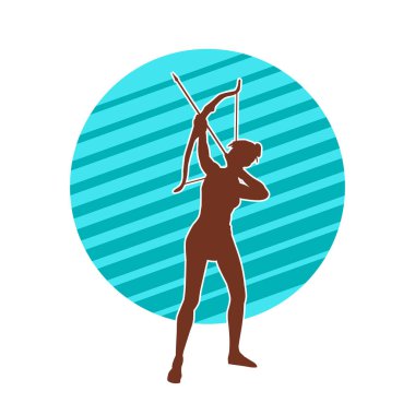 Dişi okçu bir dövüşçünün silueti ok ve yayla pozisyonunu alıyor..