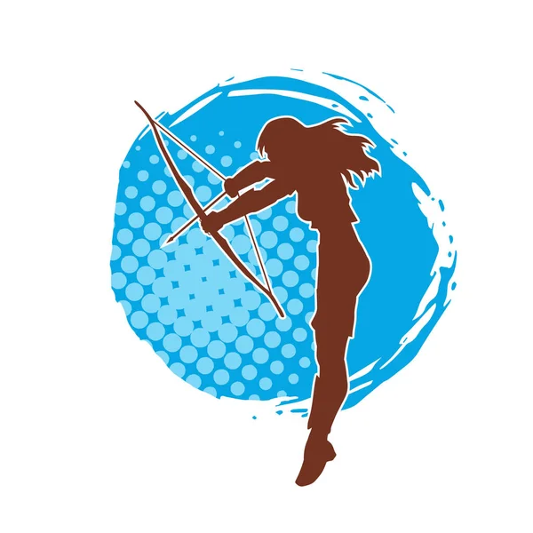 Dişi okçu bir dövüşçünün silueti ok ve yayla pozisyonunu alıyor..