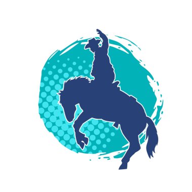 At süren bir kovboyun silueti.