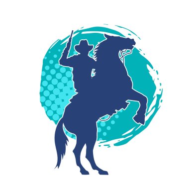 At süren ve silah taşıyan bir kovboyun silueti.