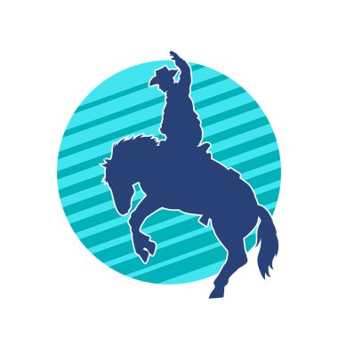 At süren bir kovboyun silueti.