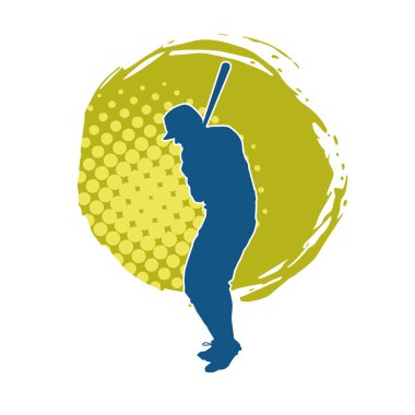 Hareketli bir erkek beyzbol oyuncusunun silueti. Vurucu olarak beyzbol oynayan bir adamın silueti..