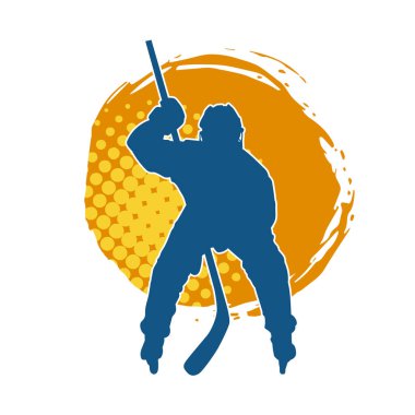 Kasklı ve üniformalı bir buz hokeyi oyuncusunun silueti.