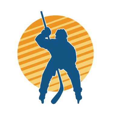 Kasklı ve üniformalı bir buz hokeyi oyuncusunun silueti.