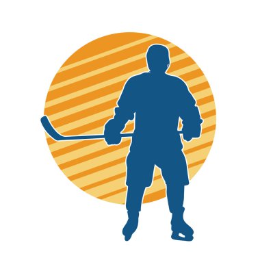 Kasklı ve üniformalı bir buz hokeyi oyuncusunun silueti.