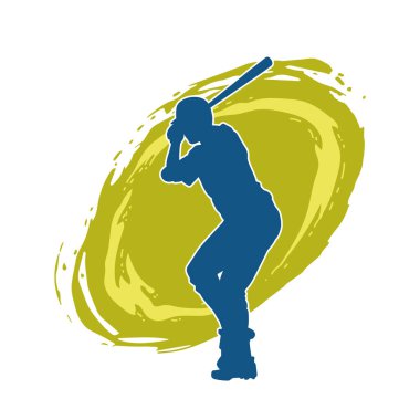 Hareketli bir erkek beyzbol oyuncusunun silueti. Vurucu olarak beyzbol oynayan bir adamın silueti..