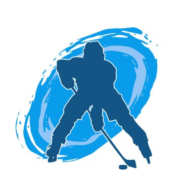 Kasklı ve üniformalı bir buz hokeyi oyuncusunun silueti.