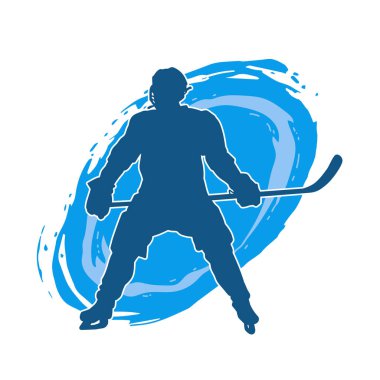 Kasklı ve üniformalı bir buz hokeyi oyuncusunun silueti.