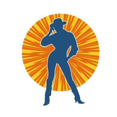 Çekici pozlarda kovboy kız kostümü giyen zayıf bir kadın modelin silueti. Ayakta duran bir kovboy kızın silueti..